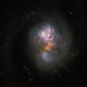 La última imagen de la fusión de galaxias tomada por el Hubble, con el centro galáctico cubierto por polvo.